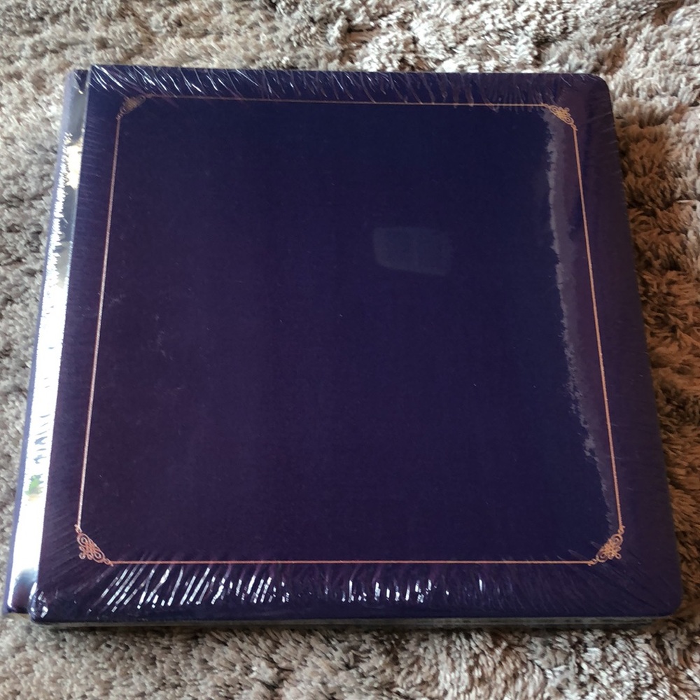 Creative Memories 12 x 12 Scrapbook Album and page protectors.